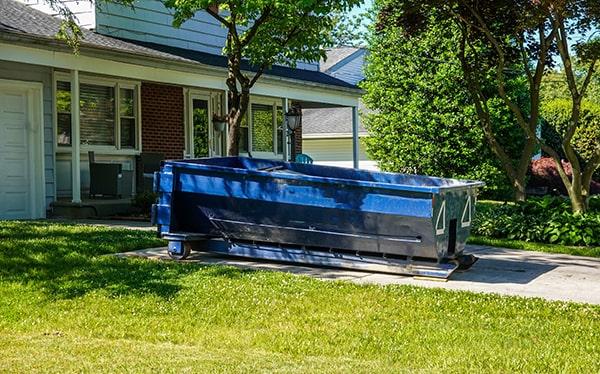 residential dumpsters can be placed on a driveway or lawn, but preventative measures need to be required to avoid damage to the property